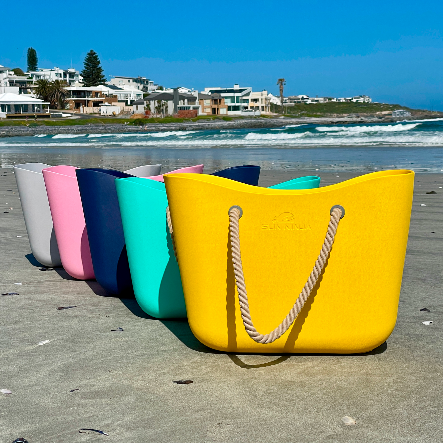 rubber-beach-tote-q0 Sun-Ninja-rubber_tote_navy_8.png